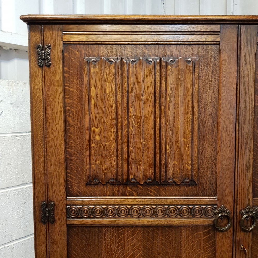AN ANTIQUE 1920's OAK DOUBLE WARDROBE View II