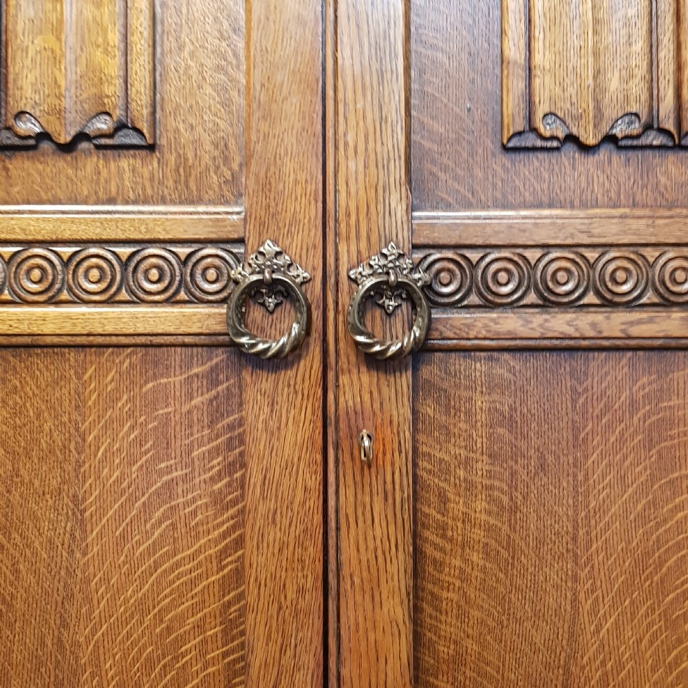 AN ANTIQUE 1920's OAK DOUBLE WARDROBE View III