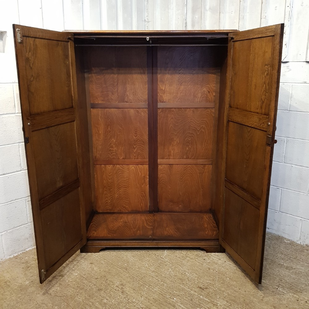 AN ANTIQUE 1920's OAK DOUBLE WARDROBE View V