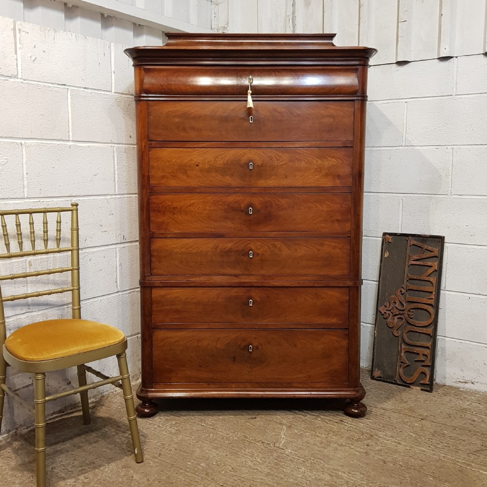 AN ANTIQUE TALL BIEDERMERE CHEST OF DRAWERS C1880