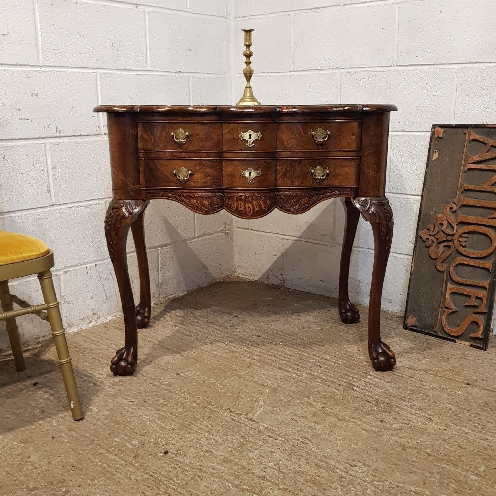 AN ANTIQUE SERPENTINE SHAPED BURR WALNUT SIDE TABLE C1920