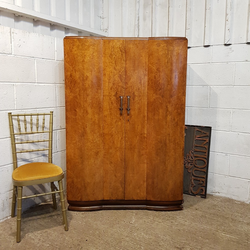 AN ANTIQUE 1920's ART DECO BOW FRONTED SMALL GENTS FITTED BURR WALNUT WARDROBE