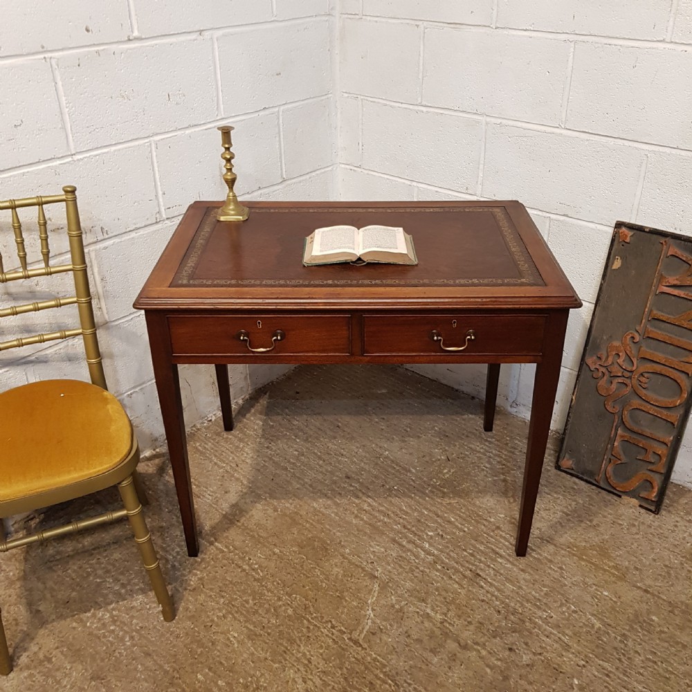 AN ANTIQUE EDWARDIAN MAHOGANY WRITING TABLE C1910