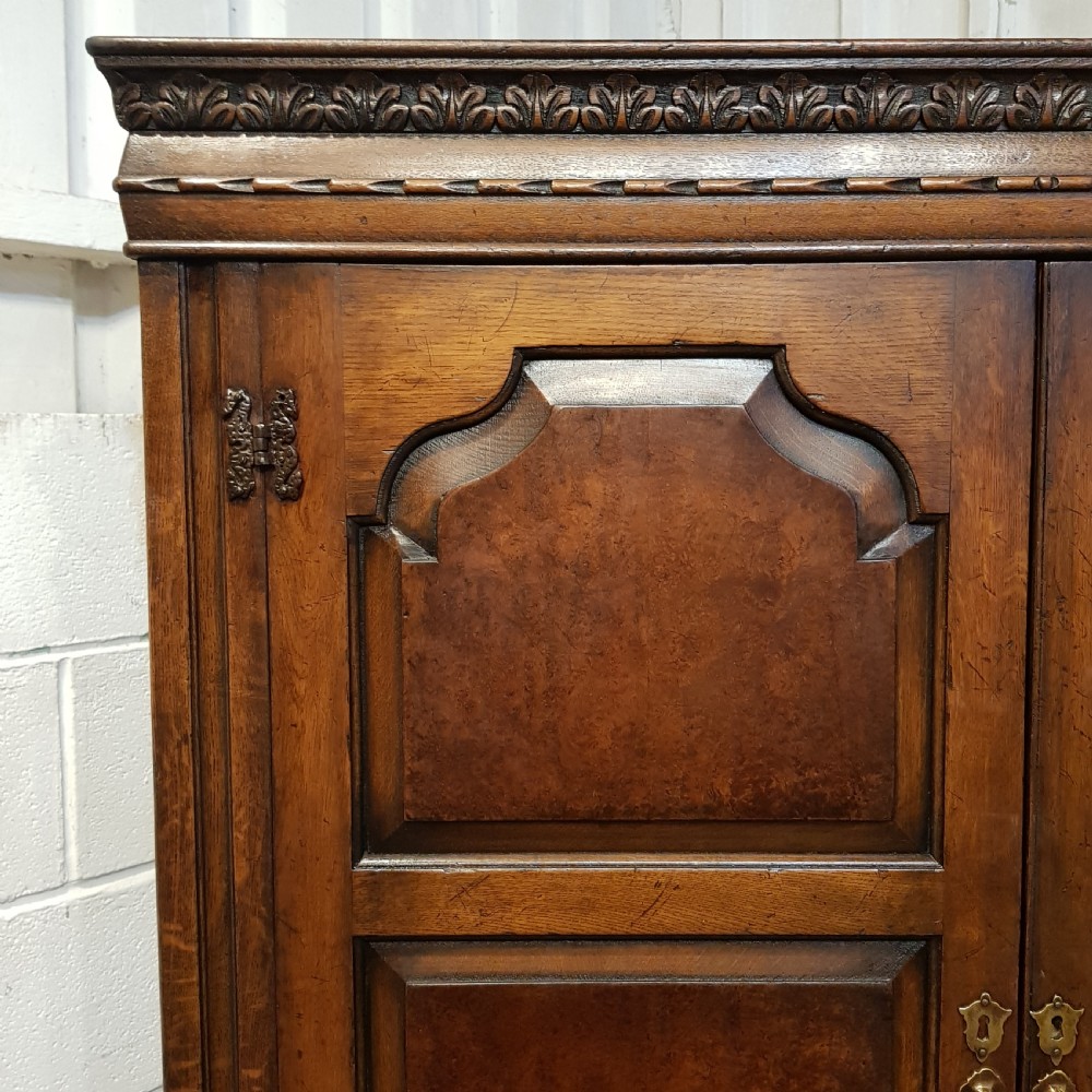 AN ANTIQUE OAK AND WALNUT DOUBLE WARDROBE C1910 View V