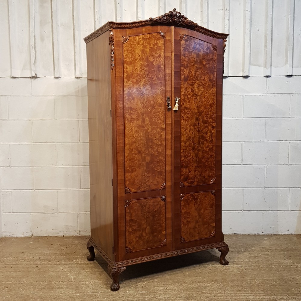 AN ANTIQUE BURR WALNUT FITTED WARDROBE C1920
