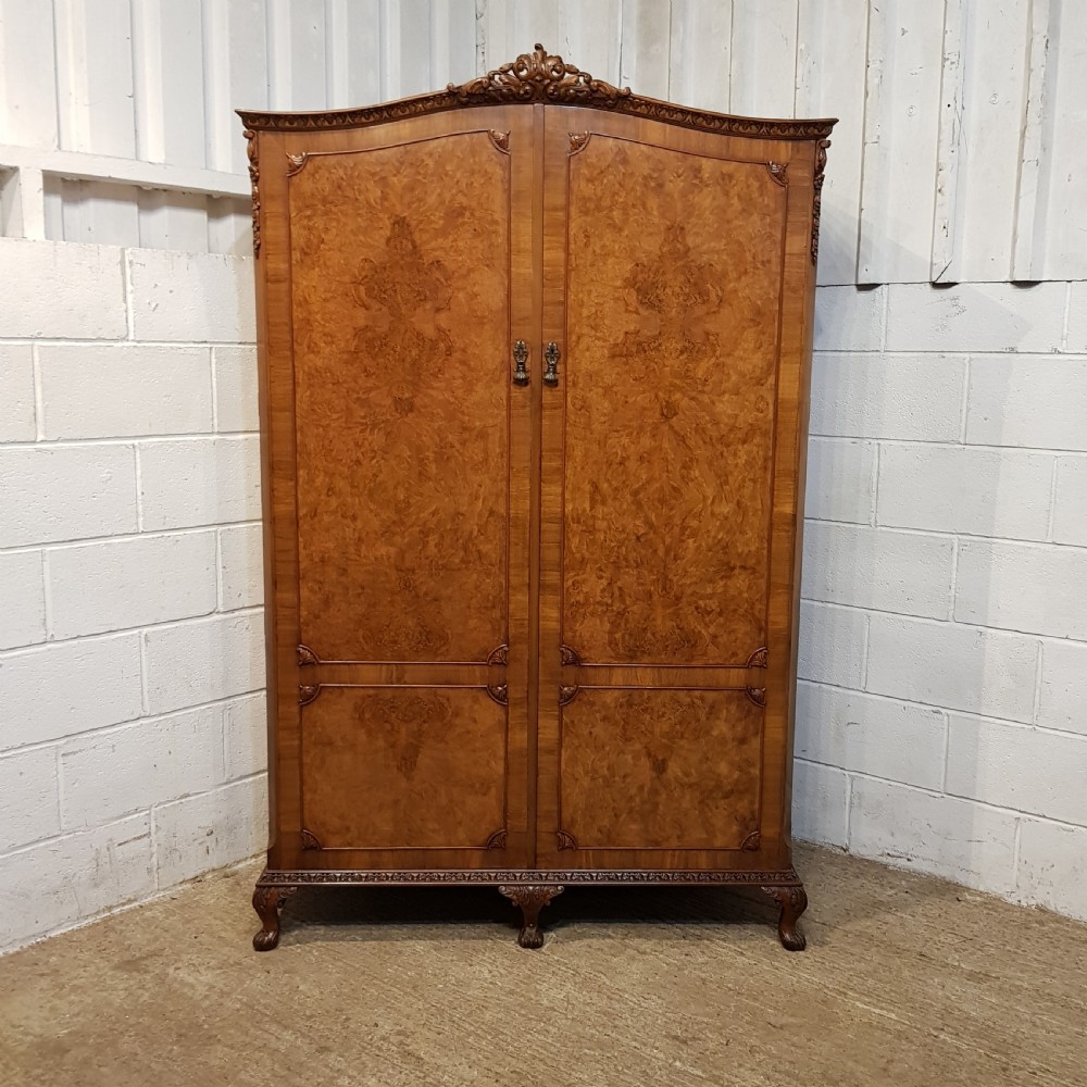 AN ANTIQUE BURR WALNUT DOUBLE WARDROBE C1920