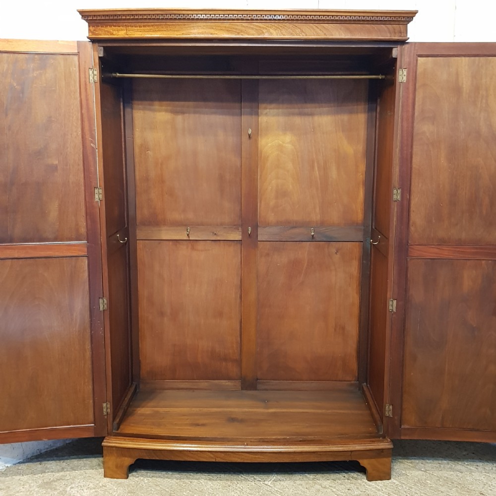 AN ANTIQUE LATE VICTORIAN MAHOGANY BOW FRONTED DOUBLE WARDROBE C1900 View IV