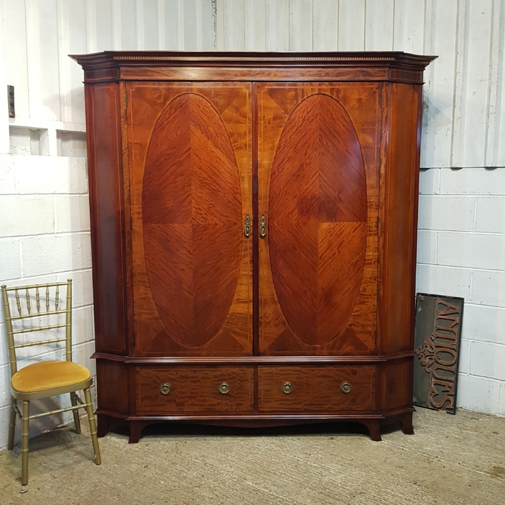 AN ANTIQUE LATE VICTORIAN DOUBLE WARDROBE C1900