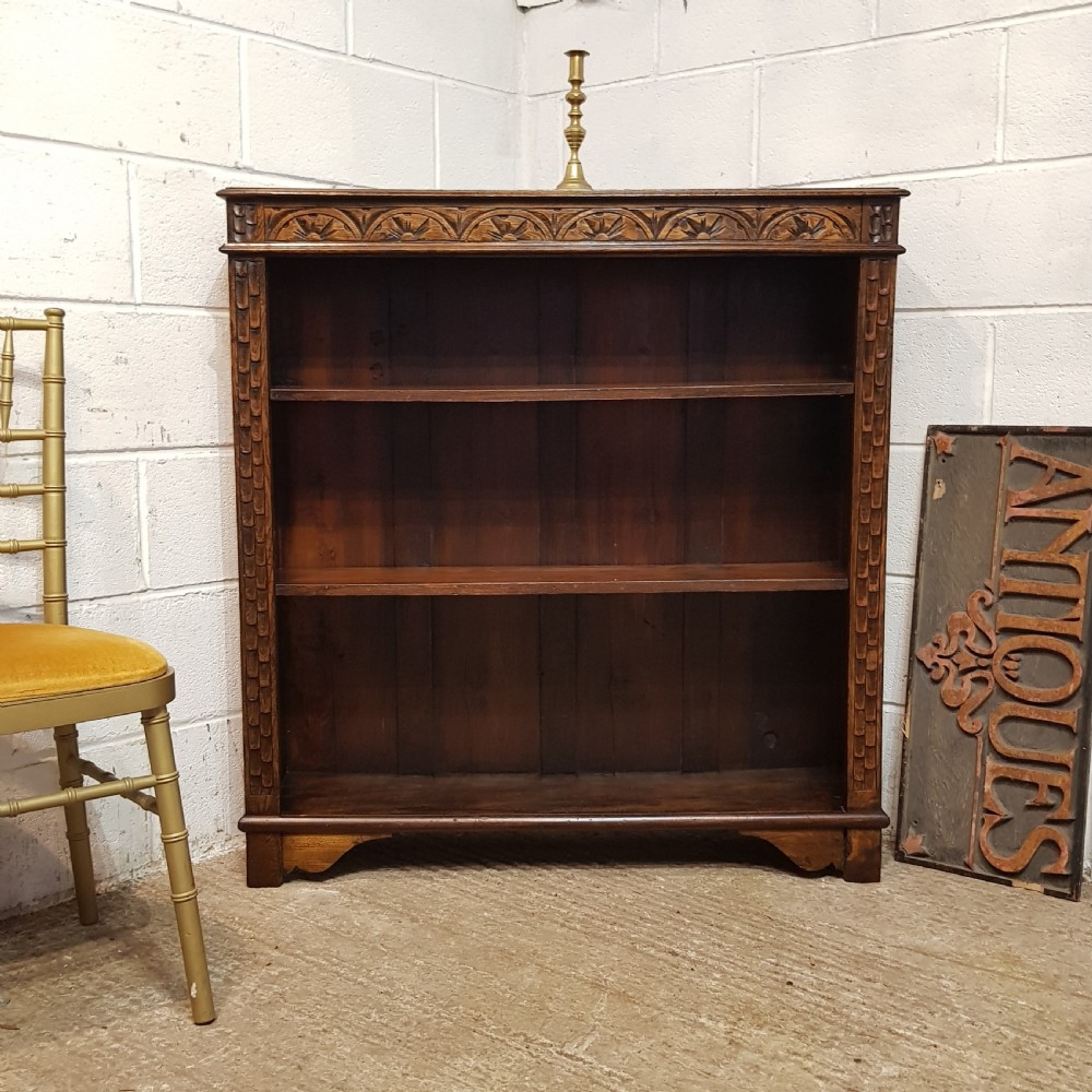 AN ANTIQUE LATE VICTORIAN CARVED OAK BOOKCASE C1900