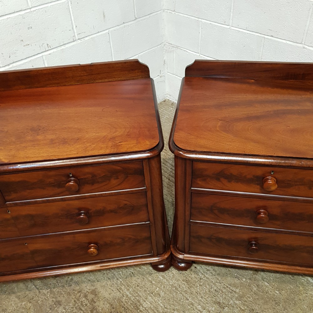 A PAIR OF VICTORIAN MAHOGANY THREE HEIGHT CHEST OF DRAWERS C1880 View IV