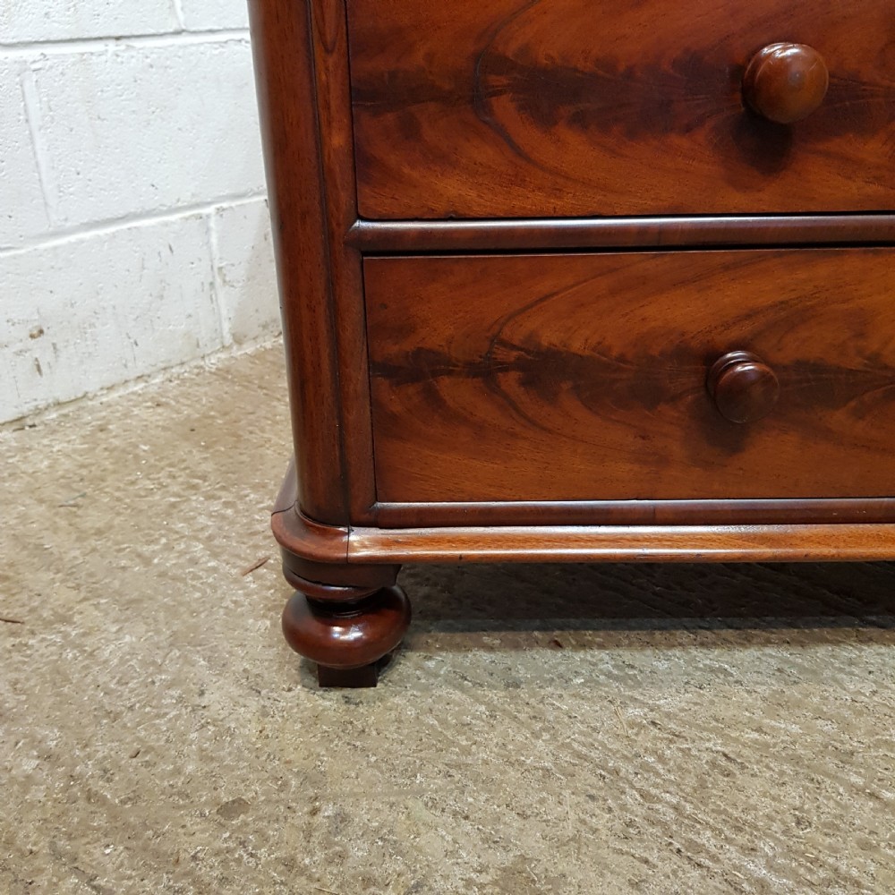 A PAIR OF VICTORIAN MAHOGANY THREE HEIGHT CHEST OF DRAWERS C1880 View V
