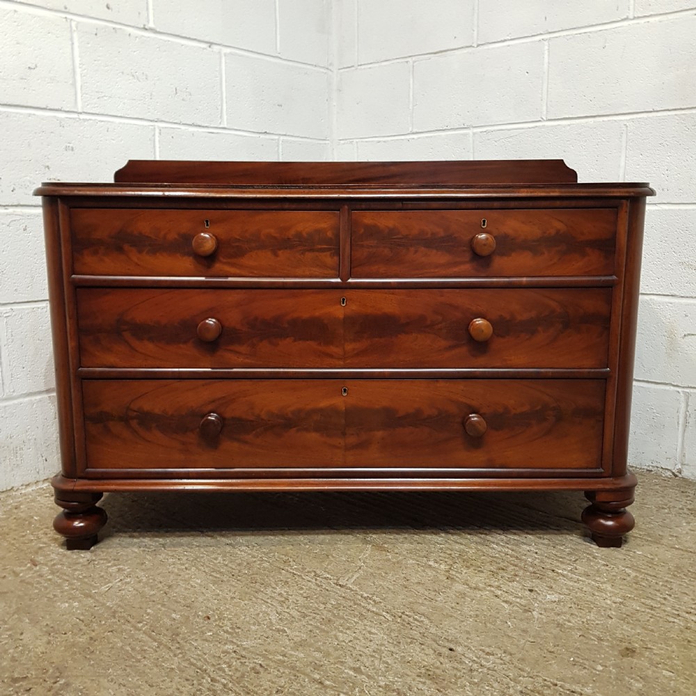 A PAIR OF VICTORIAN MAHOGANY THREE HEIGHT CHEST OF DRAWERS C1880 View VI