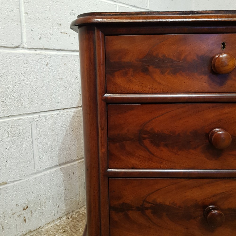 A PAIR OF VICTORIAN MAHOGANY THREE HEIGHT CHEST OF DRAWERS C1880 View VII