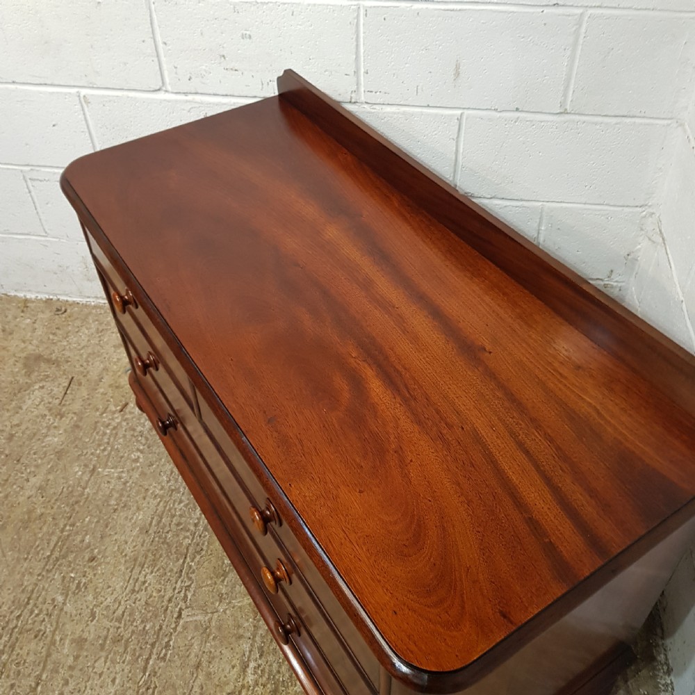 A PAIR OF VICTORIAN MAHOGANY THREE HEIGHT CHEST OF DRAWERS C1880 View IX