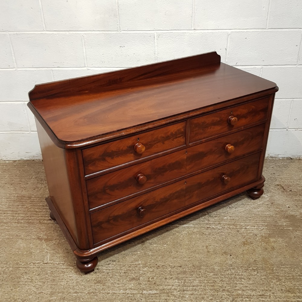 A PAIR OF VICTORIAN MAHOGANY THREE HEIGHT CHEST OF DRAWERS C1880 View X