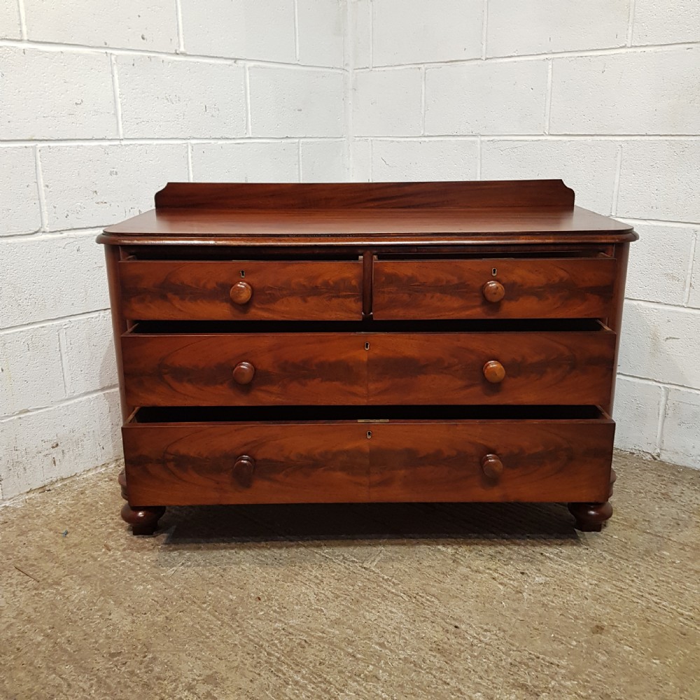 A PAIR OF VICTORIAN MAHOGANY THREE HEIGHT CHEST OF DRAWERS C1880 View XII