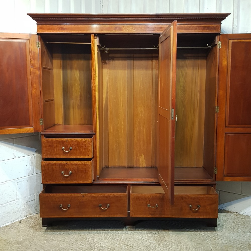AN EDWARDIAN MAHOGANY TRIPLE WARDROBE C1900. View VII
