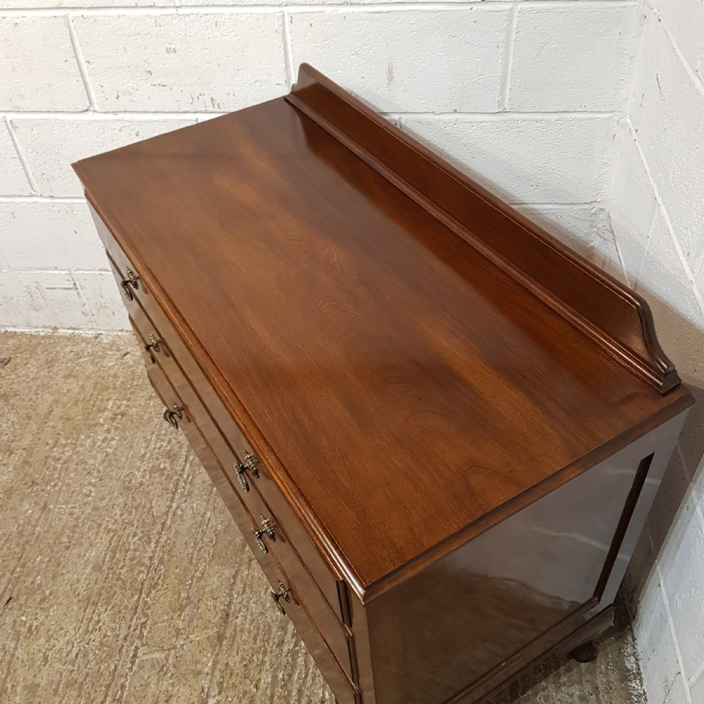 AN ANTIQUE 3 HEIGHT MAHOGANY CHEST OF DRAWERS C1920 View VIII