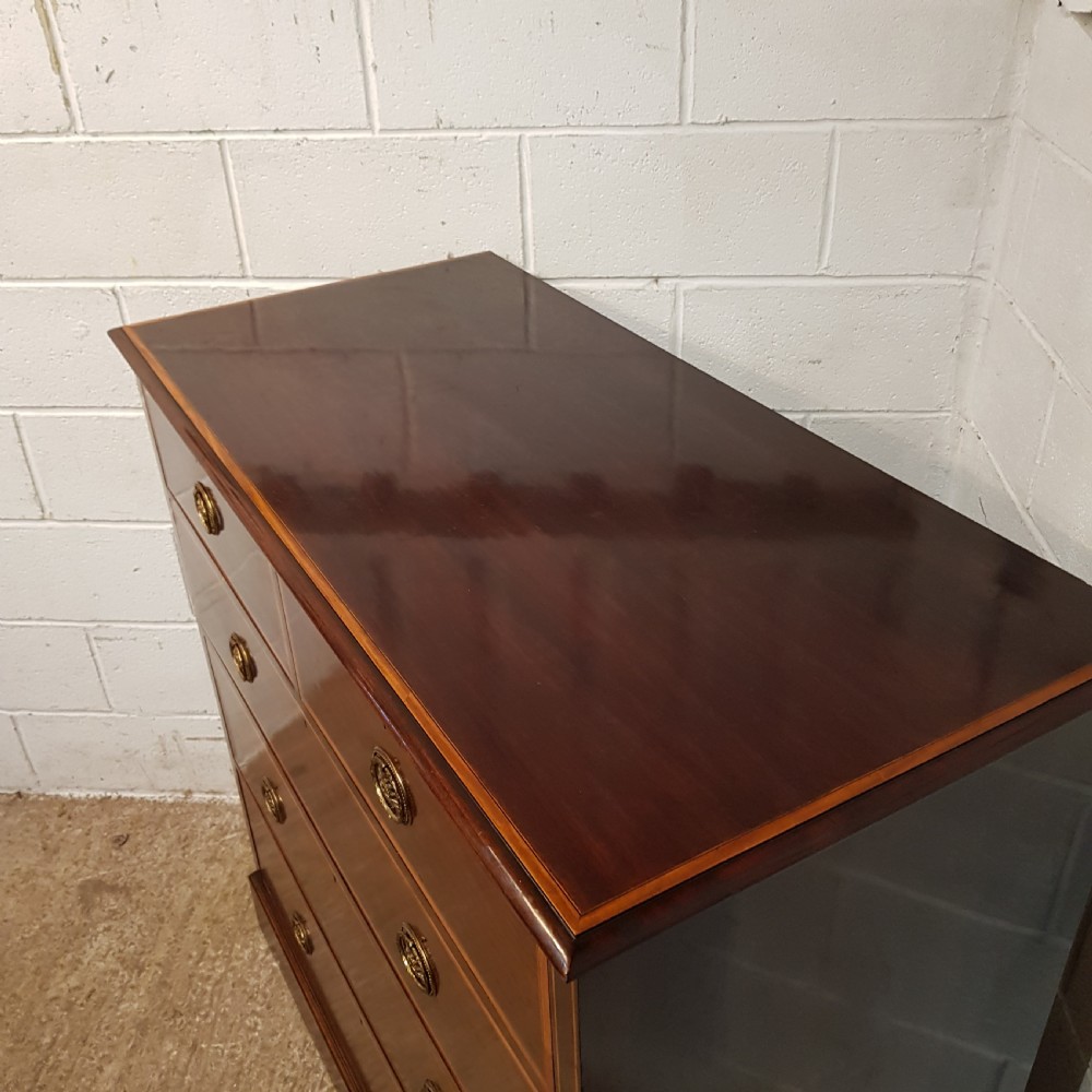AN EDWARDIAN 4 HEIGHT MAHOGANY CHEST OF DRAWERS BY ROBINSONS OF NEWCASTLE C1900 View III