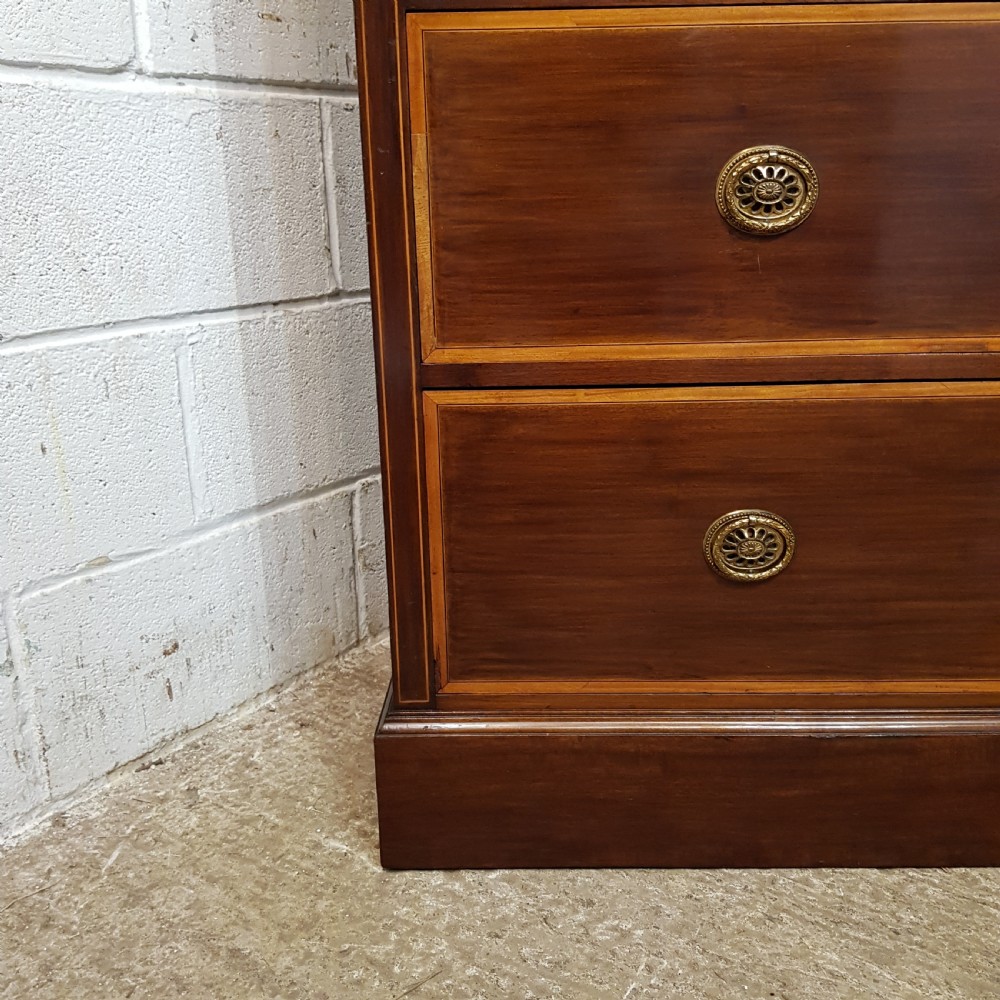 AN EDWARDIAN 4 HEIGHT MAHOGANY CHEST OF DRAWERS BY ROBINSONS OF NEWCASTLE C1900 View IV