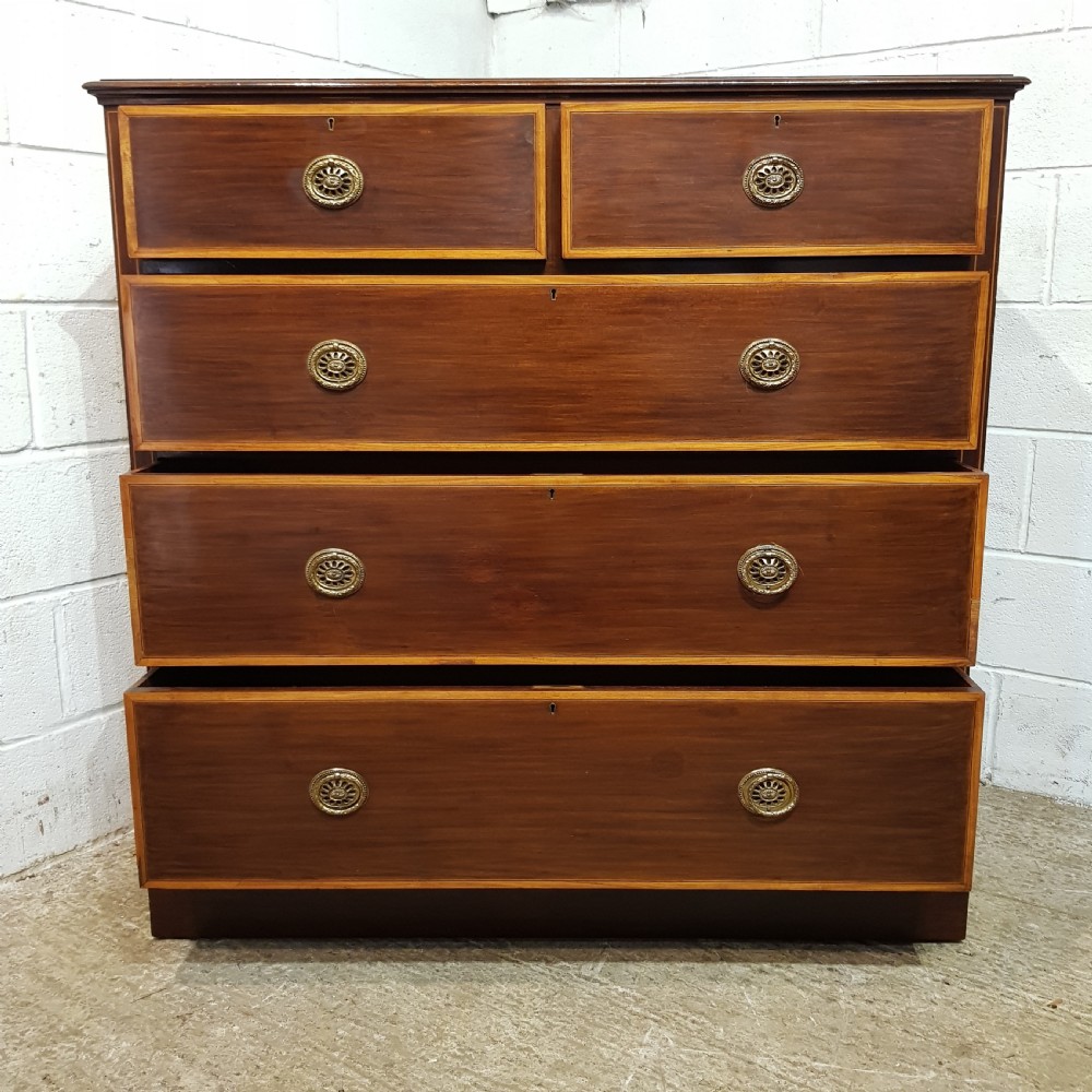 AN EDWARDIAN 4 HEIGHT MAHOGANY CHEST OF DRAWERS BY ROBINSONS OF NEWCASTLE C1900 View V
