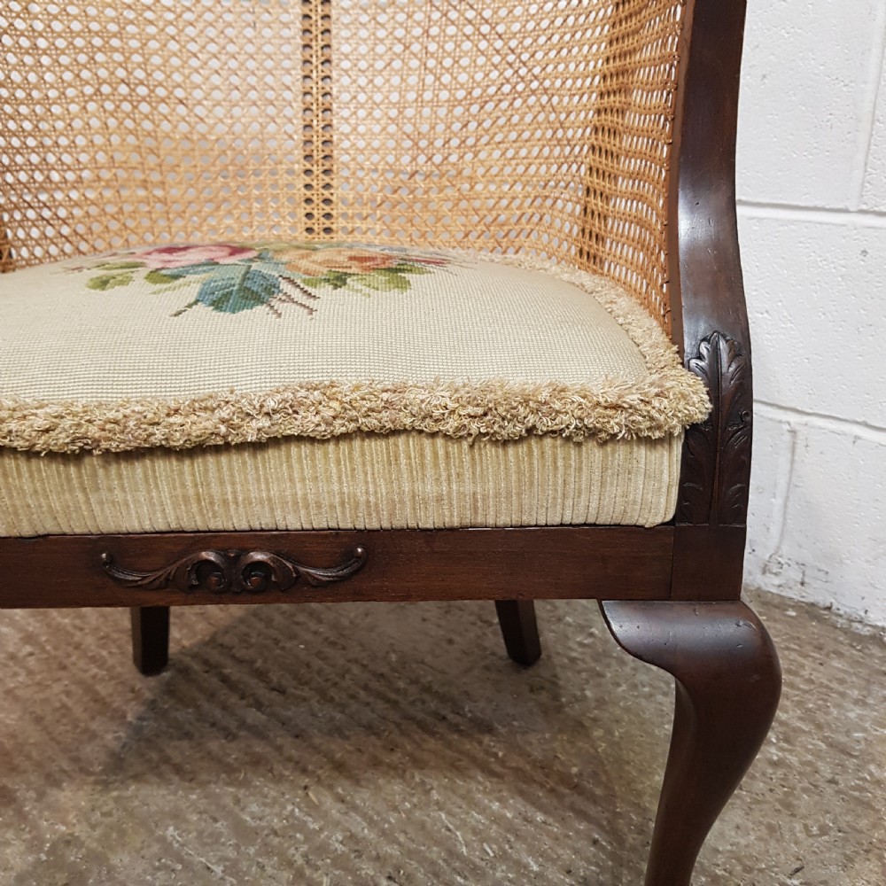 A DENBY & SPINKS MAHOGANY FRAMED BERGERE BACKED TUB CHAIR C1920 View II