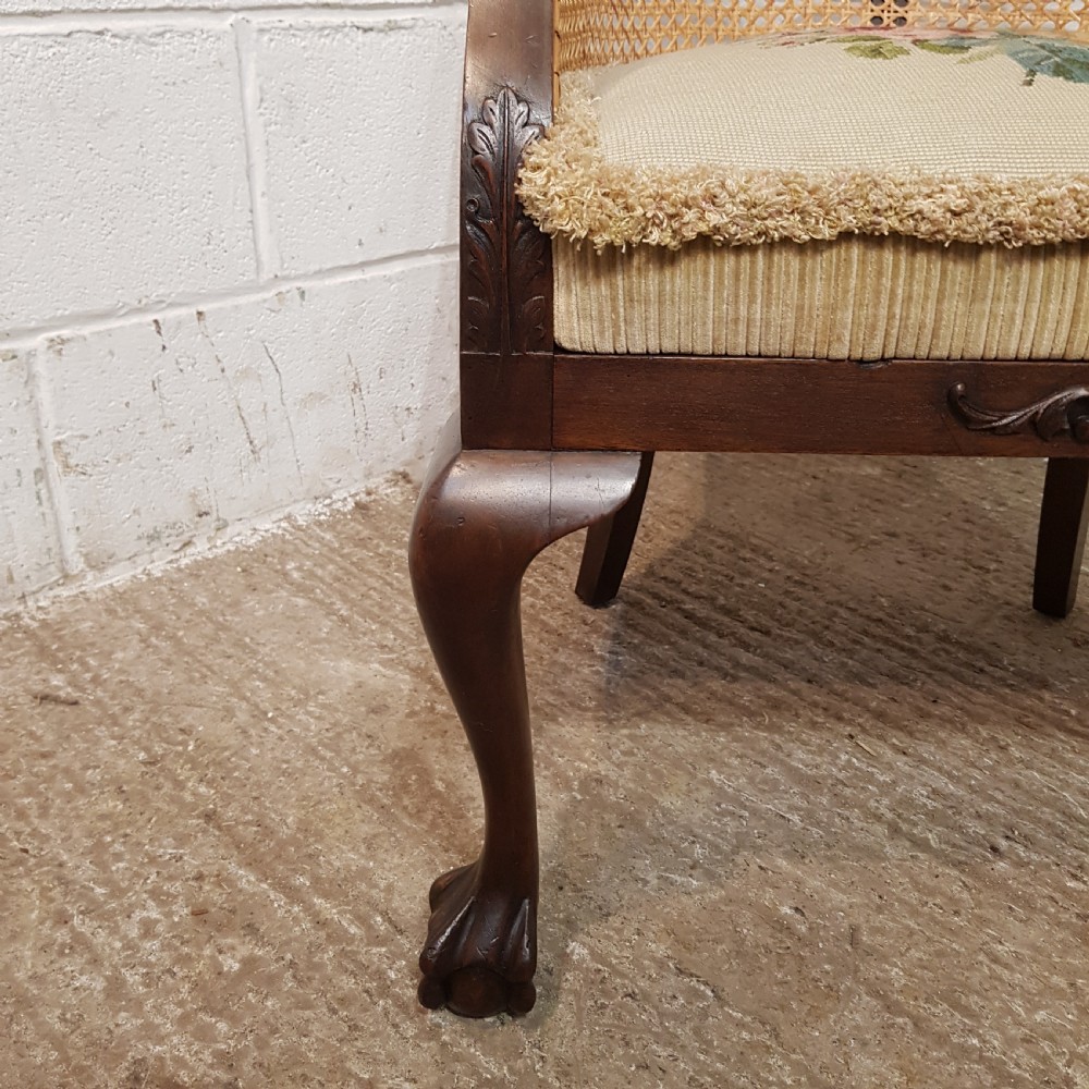 A DENBY & SPINKS MAHOGANY FRAMED BERGERE BACKED TUB CHAIR C1920 View III