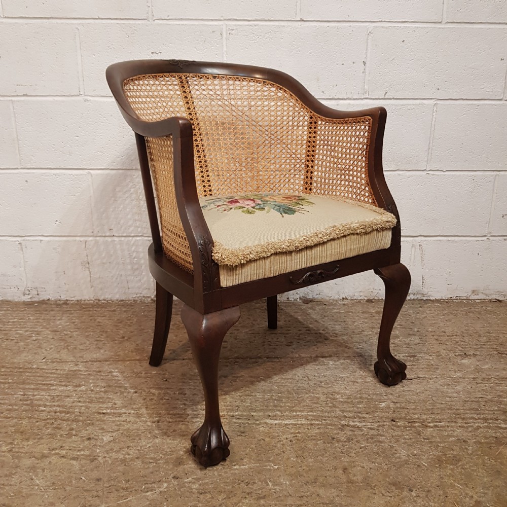 A DENBY & SPINKS MAHOGANY FRAMED BERGERE BACKED TUB CHAIR C1920 View XII