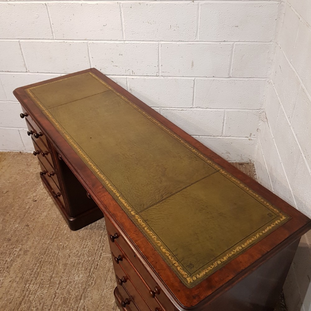 A VICTORIAN LONG MAHOGANY DESK C1880 View V