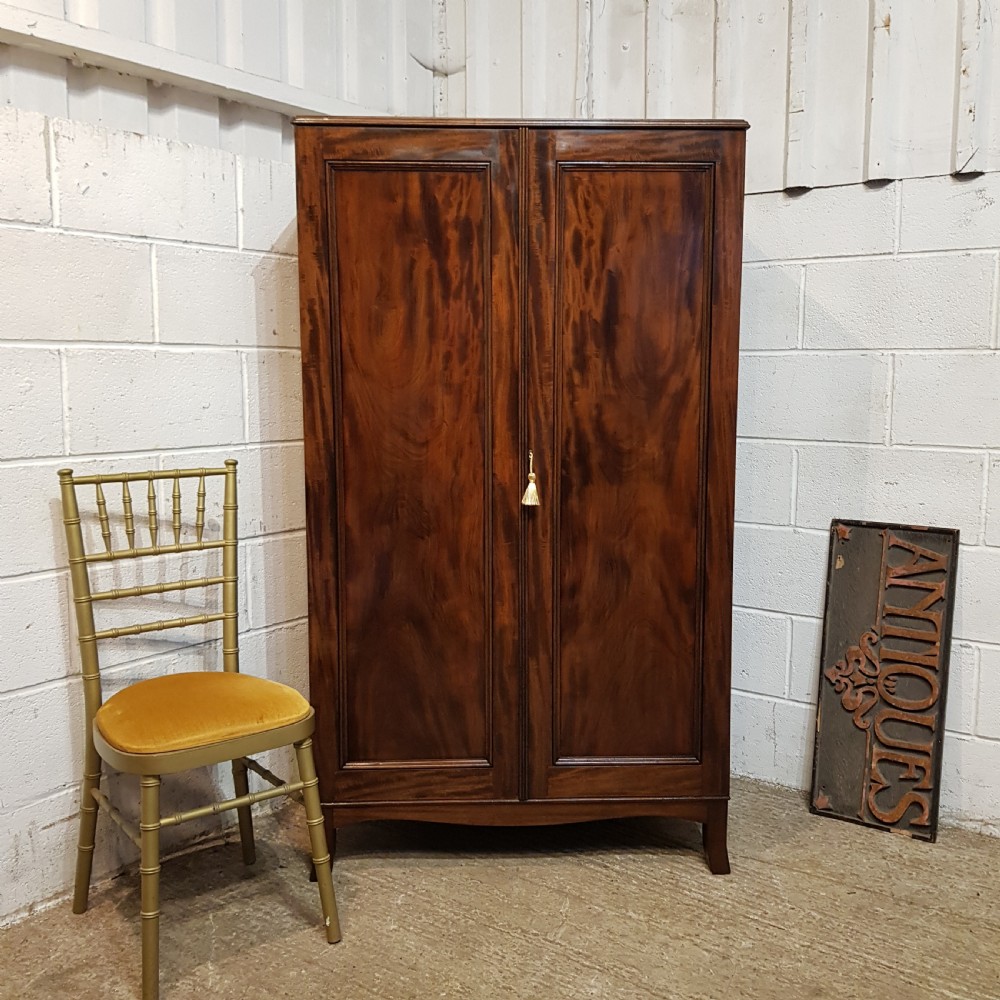 A GEORGE 3rd SMALL MAHOGANY WARDROBE C1800