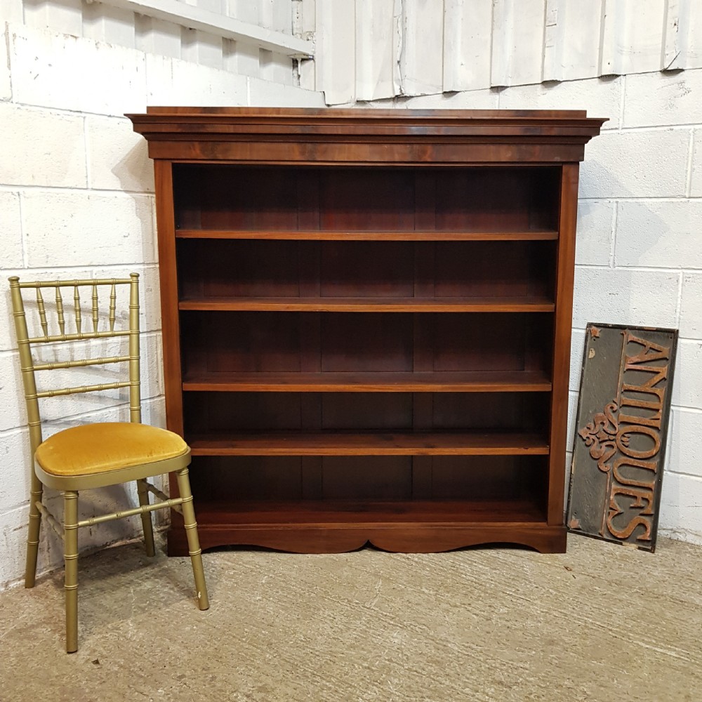 A LARGE VICTORIAN OPEN MAHOGANY BOOKCASE C1880