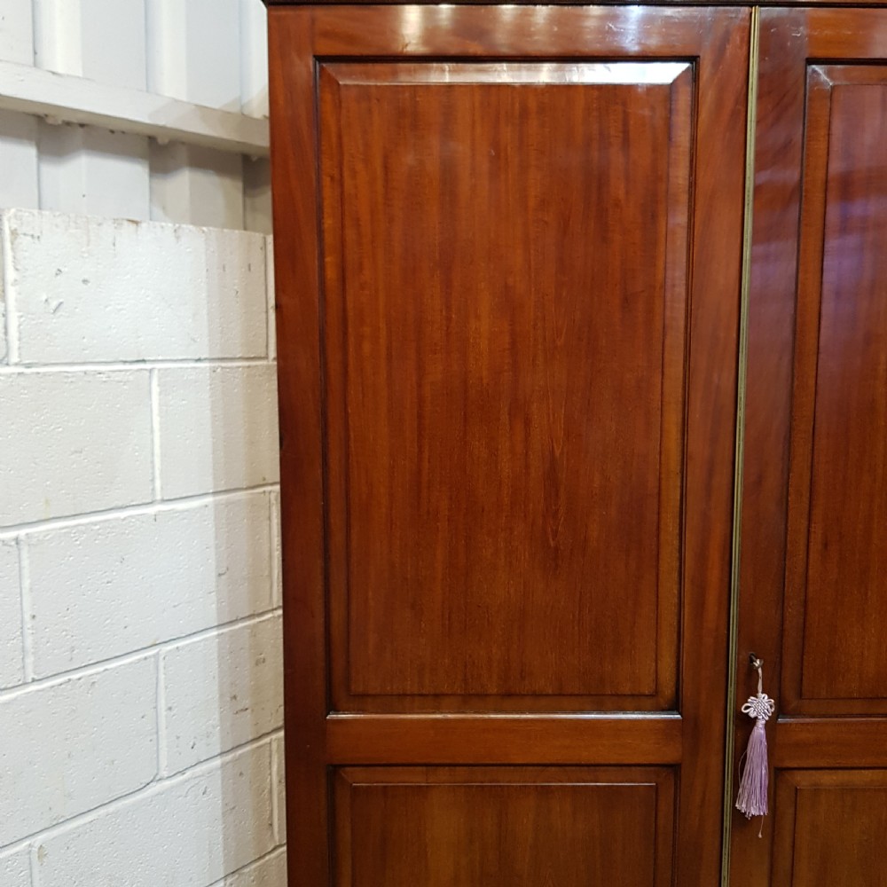 AN ANTIQUE REGENCY MAHOGANY DOUBLE WARDROBE C1810 View IV