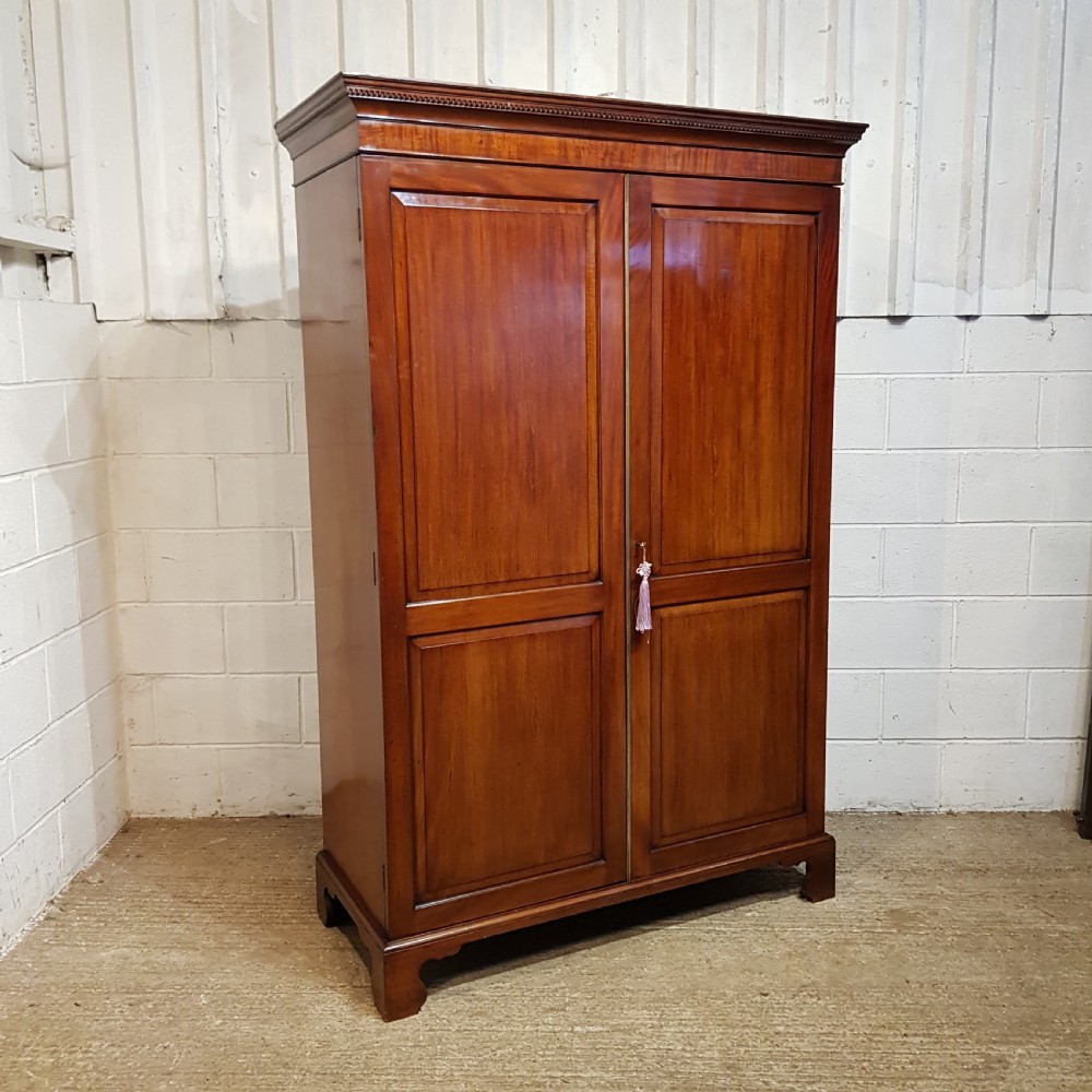 AN ANTIQUE REGENCY MAHOGANY DOUBLE WARDROBE C1810 View VI