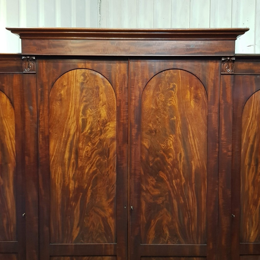 A WILLIAM 4th MAHOGANY FOUR DOOR BREAKFRONT TRIPLE WARDROBE C1830 View II