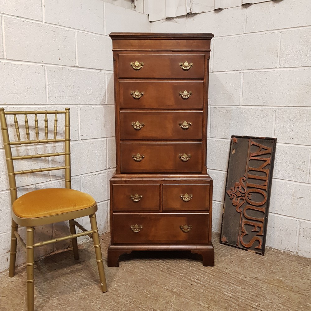 AN ANTIQUE WALNUT DWARF CHEST ON CHEST C1920