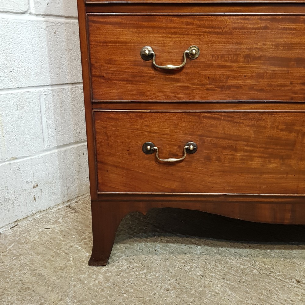 A REGENCY MAHOGANY FOUR HEIGHT CHEST OF DRAWERS C1810 View II