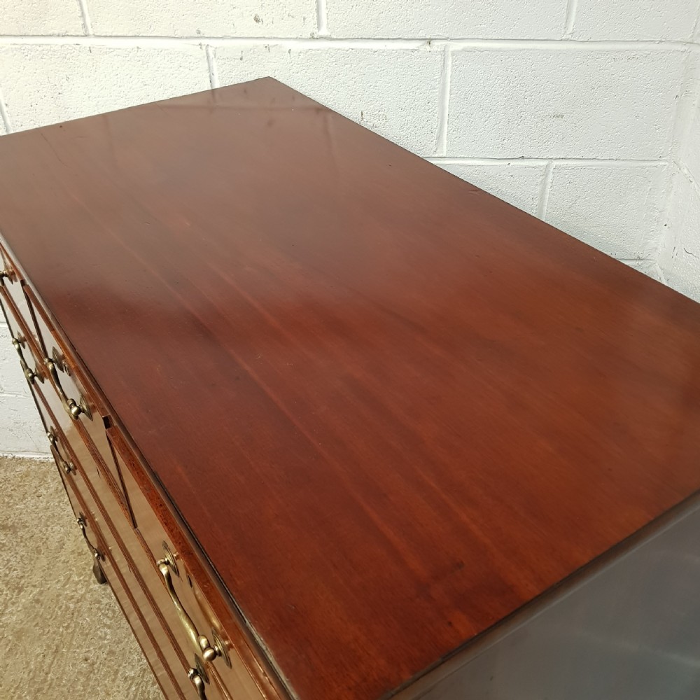 A REGENCY MAHOGANY FOUR HEIGHT CHEST OF DRAWERS C1810 View V