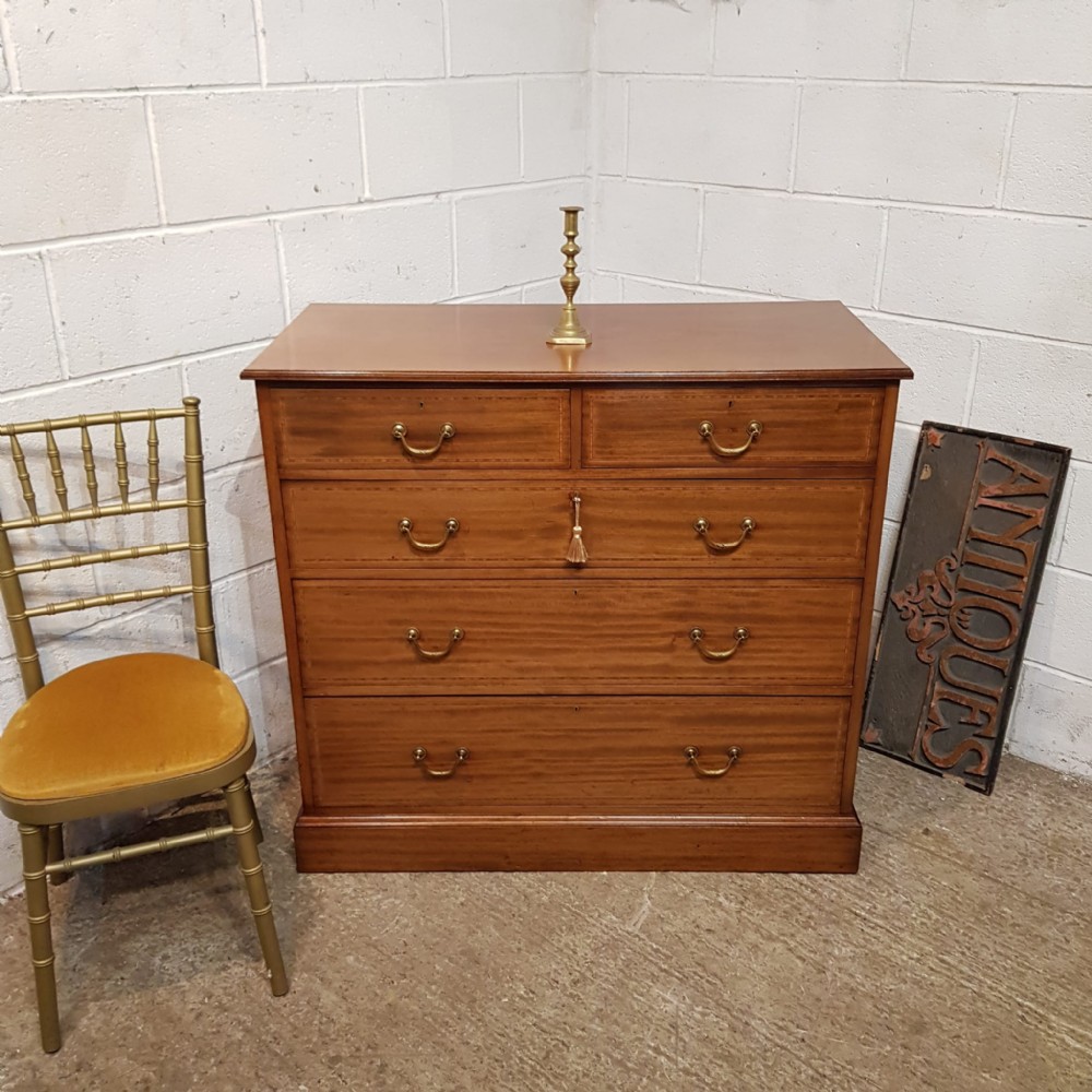 AN EDWARDIAN MAHOGANY 4 HEIGHT CHEST OF DRAWERS C1900