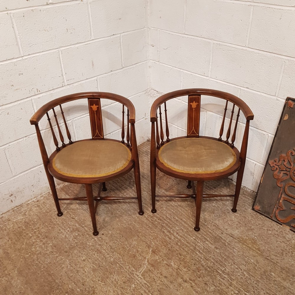 A PAIR OF EDWARDIAN MAHOGANY TUB CHAIRS C1900