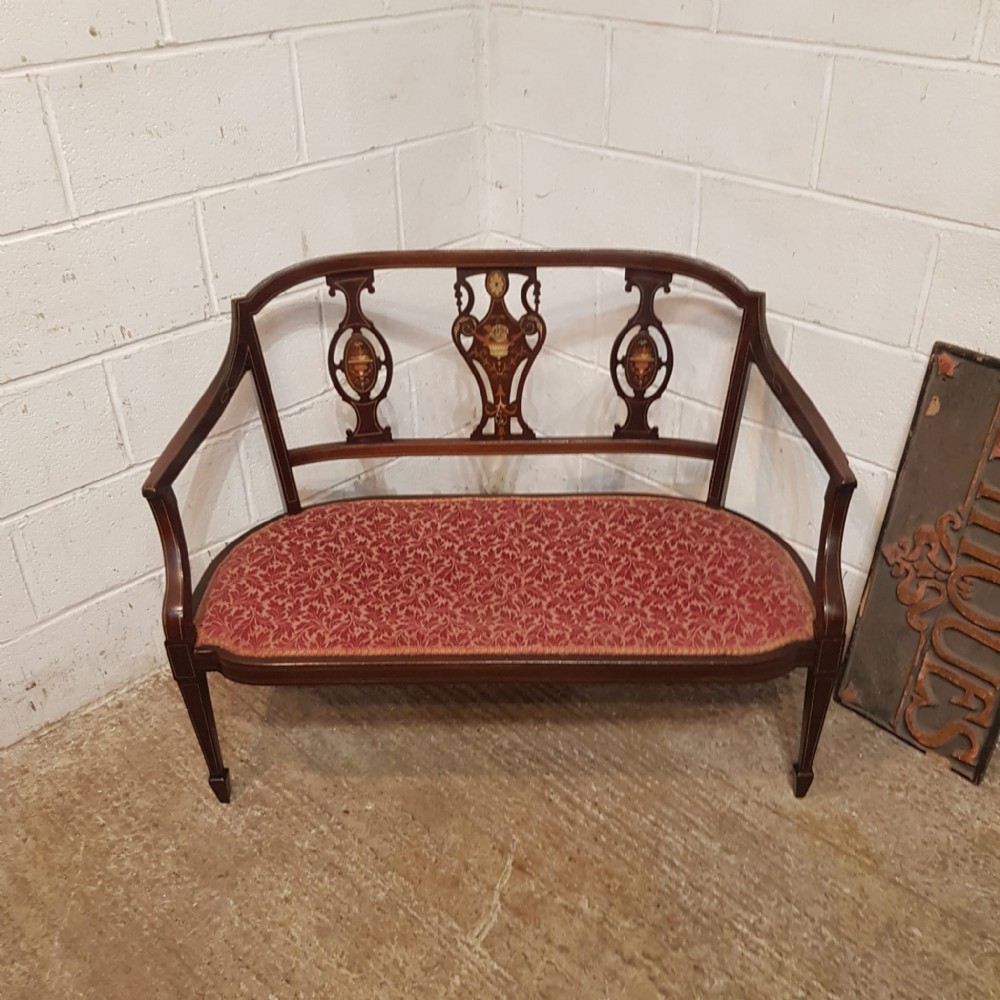 AN EDWARDIAN MAHOGANY SALON SOFA C1900