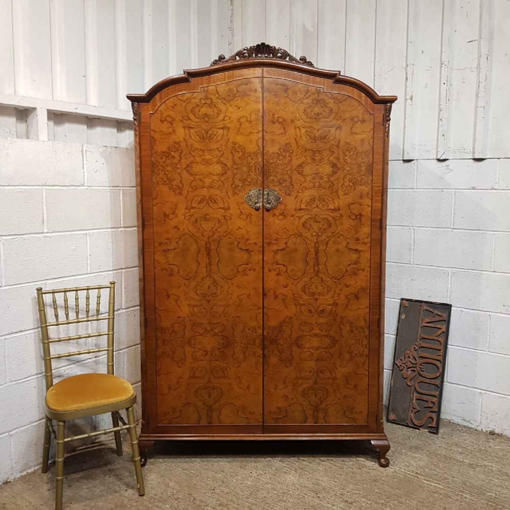 AN ANTIQUE BURR WALNUT DOUBLE WARDROBE C1920