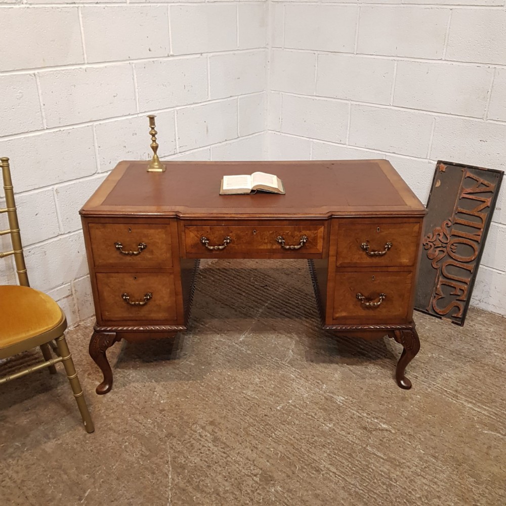 A BURR WALNUT TWIN PEDESTAL DESK C1920