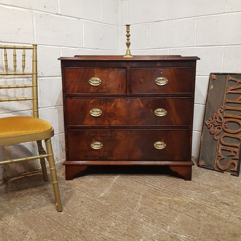 A 3 HEIGHT MAHOGANY CHEST OF DRAWERS C1920