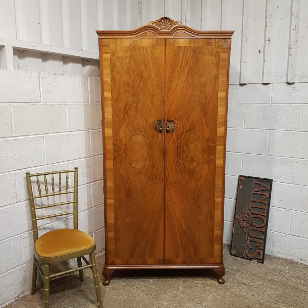 A BURR WALNUT FITTED WARDROBE C1920