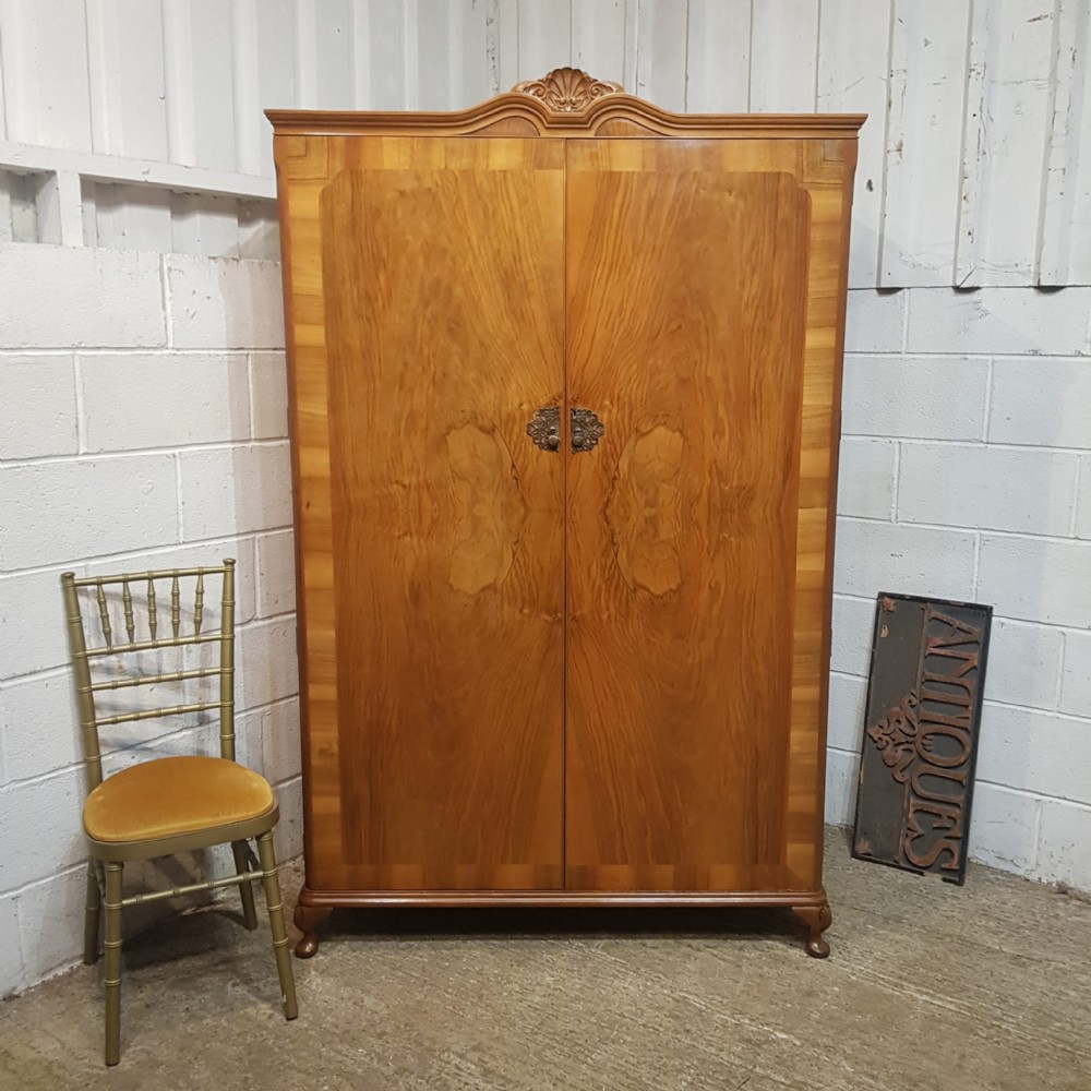 A BURR WALNUT DOUBLE WARDROBE C1920
