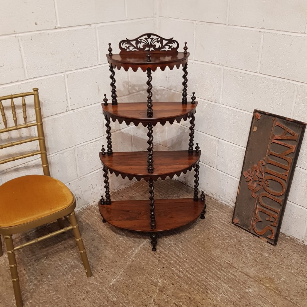A VICTORIAN ROSEWOOD DEMI LUNE SHAPED WOT NOT C1880