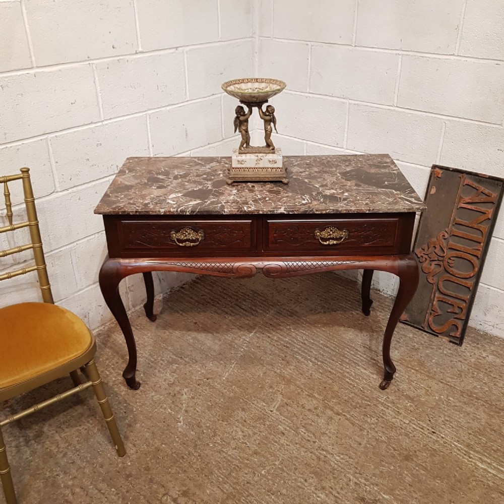 AN ART NOUVEAU MARBLE TOPPED CONSOLE TABLE C1890
