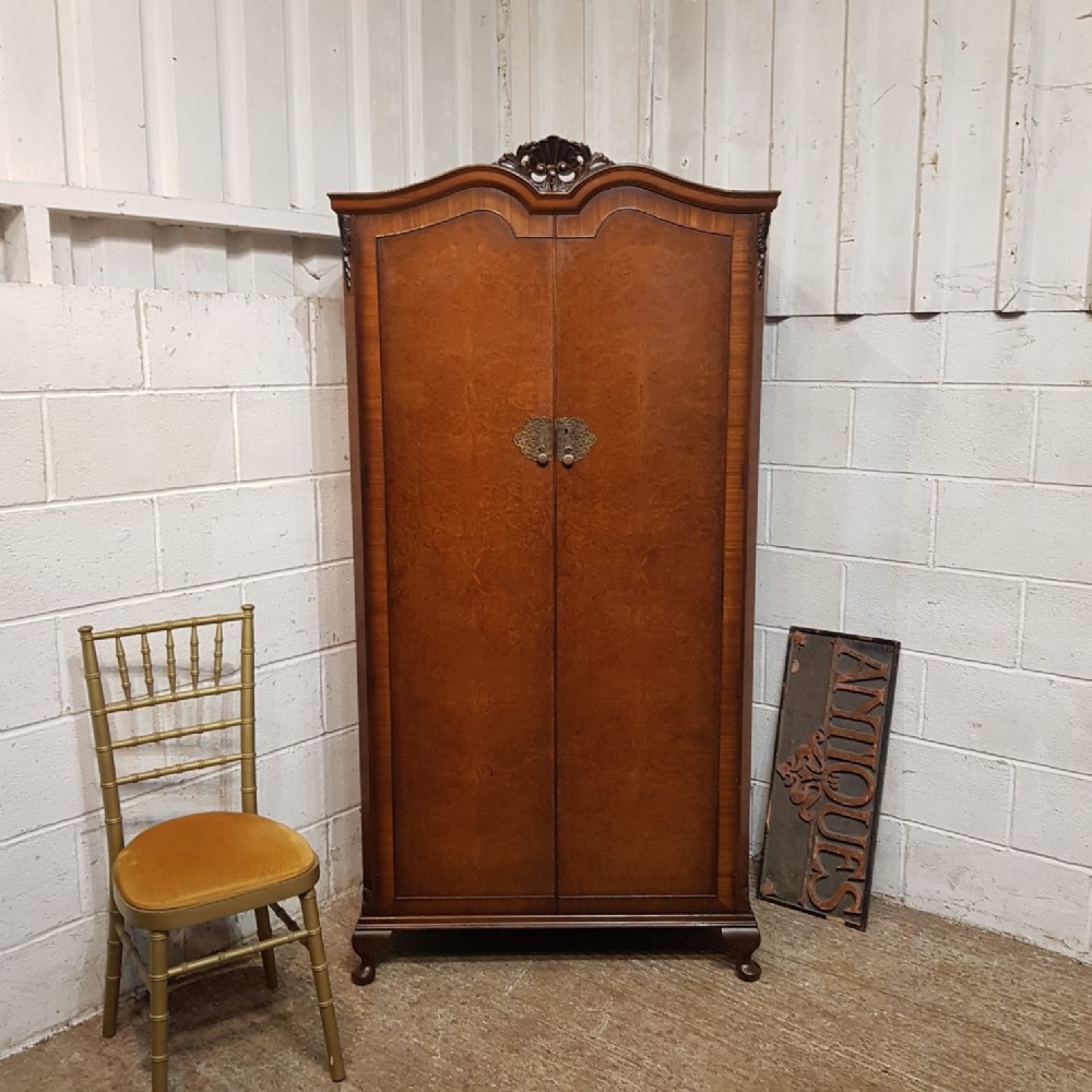 AN ANTIQUE BURR WALNUT WARDROBE C1920