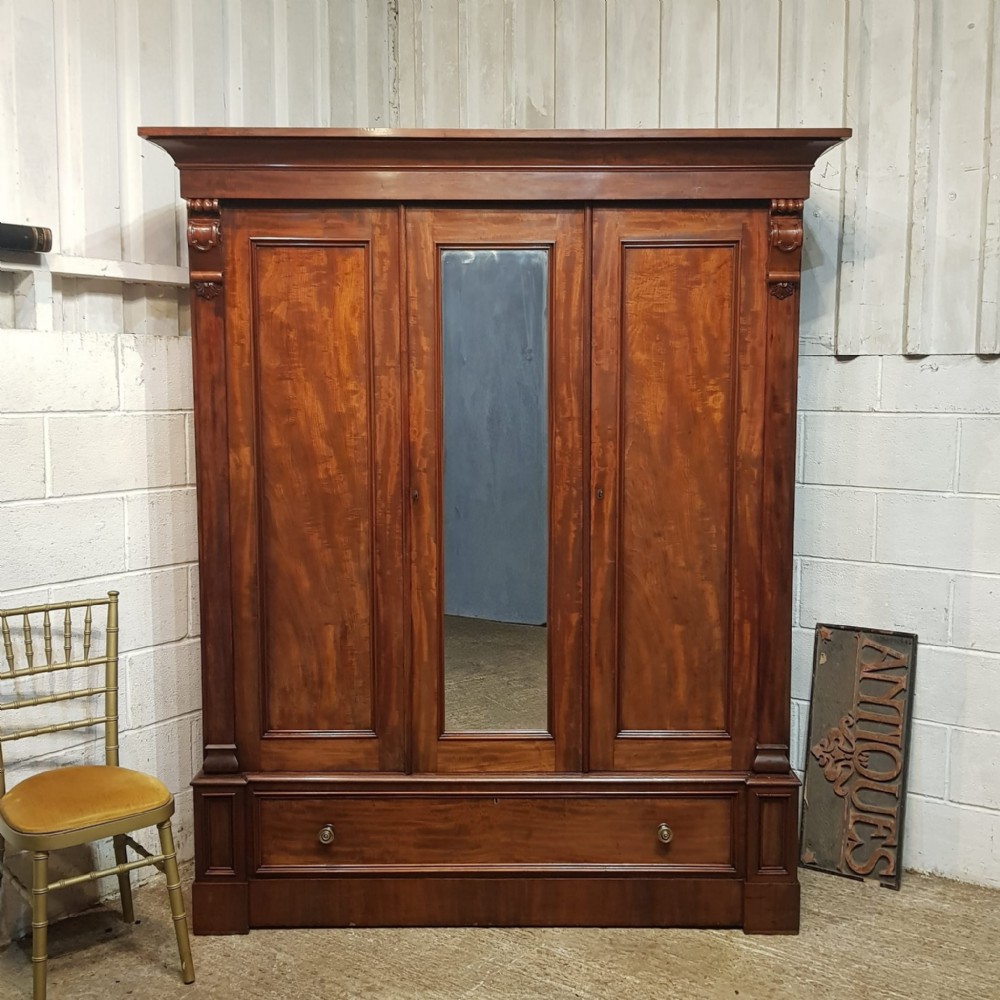 A WILLIAM 4th MAHOGANY TRIPLE WARDROBE C1830