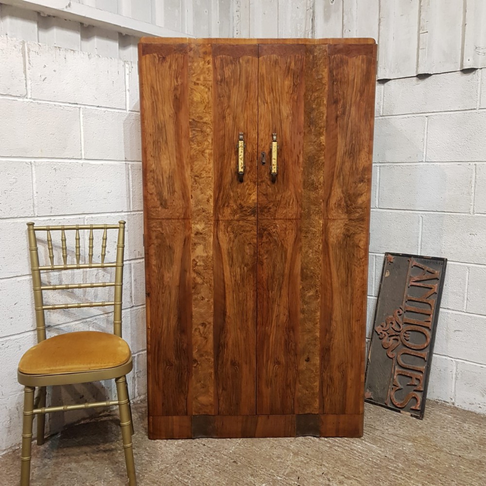 AN ART DECO BURR WALNUT SMALL FITTED WARDROBE C1920